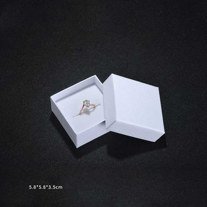 white ring box